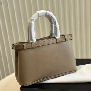 10A Designer The new season of handbag single shoulder bag cowhide version features simple lines and exquisite elements intertwined The detachable shoulder strap