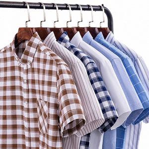 Letnie koszule z krótkim rękawem dla mężczyzn w 100% zjechana koszula miękkie topy oxford w paski w kratę ubrania biała koszula Social Slim Fit Dr 85mt#