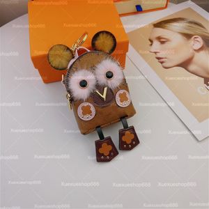 Designer väskor Kvinnor Key Plånböcker Owl Mini ryggsäckar kaninpåse påsar bagageutrymme mynt förföljer nyckelring bokstäver plånböcker fickpar hörlurar väskor hänge charm