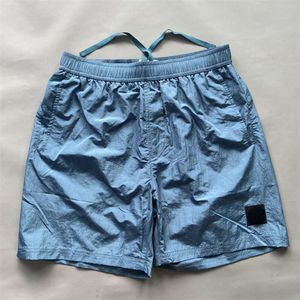 Nya klassiska mäns utomhus Casual Löst montering Snabbtorkande metall Nylon 5 Point med trendiga märkeshorts