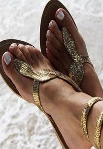 Sandaler Kvinnor Flats 2022 Summer Snake Ankle Strap Bling Gold Beach Flat Shoes Storlek 35-434014632