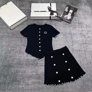 Designer de verão senhoras moda casual colete de malha + luxo estiramento saia quadril conjunto de alta qualidade dois 2c saia de malha sem mangas conjunto feminino de duas peças preto branco