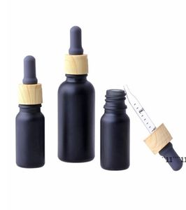 Matte Black Glass e liquid Essential Oil Perfume Bottle with Reagent Pipette Dropper and Wood Grain Cap 1030ml BBF114105341255