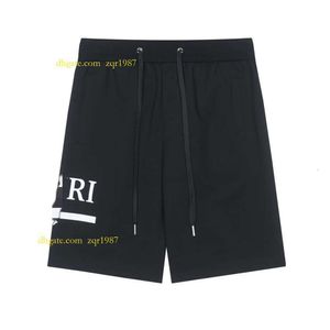 Amirir Camicia Triangolo Uomo Pantaloncini corti da spiaggia Estate Uomo Moda Hip Hop Lettera Stampa Pantaloni Pantaloni Uomo Donna Pantaloncini multicolori Pantaloni larghi Pantaloni sportivi pantoufle