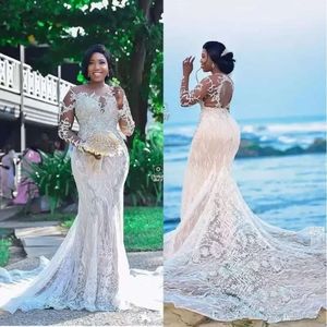 Nuovi abiti da sposa sexy vintage con maniche lunghe in pizzo africano con perline di lusso e collo trasparente Weca