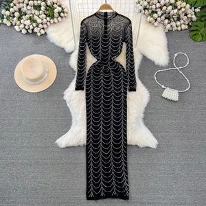 Fashionable socialite temperament sexy long sleeved stand up collar waist cinching slimming effect transparent mesh diamond wrap buttocks dress for women 240329