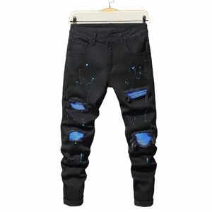 2023 Męskie dżinsy chłodne rozryte chude spodnie rozciągnij Slim Denim Pants Patchwork Hip Hop Black Blue Casual Jogging Dżinsy dla mężczyzn 82dc#