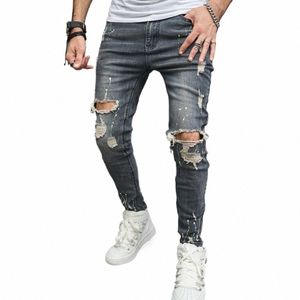 rippade magra män blyerts jeans byxor snygga manliga hiphop -fläckar bläck tryckta hål distriktade stretch denim byxor för mäns b3i8#