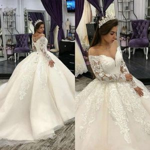 Neue Ballkleid Brautkleider Braut Sweep Zug Spitze Applikation U-Ausschnitt Sheer Neck Maßgeschneiderte lange Ärmel Schlosskapelle Vestido De Novia