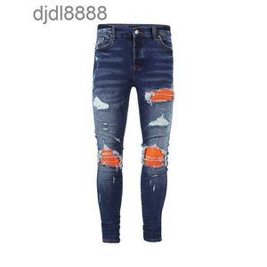 Calças de grife masculinas na moda fora amira jeans luz azul retalhos laranja couro duplo joelho rasgado faca corte masculino