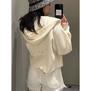 Nya koreanska Roewe Autumn Winter High End dragkedja Huven Stickad Relief Sweater Fashion Loose Poat for Women