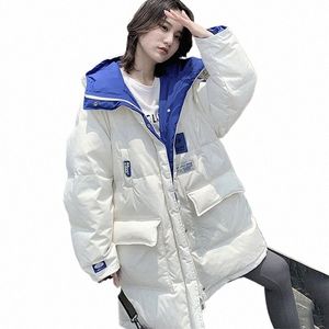 Kvinnors huva jacka 2024 Nya vinterparkor vändbara ned Cott Coat Casual Warm Topps Parka Midlängd Kvinnliga utkläder E5LU#