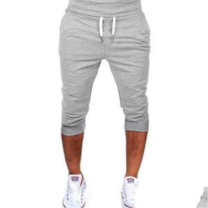 Pantaloni da uomo Nuovi uomini Stile commercio estero Europei e americani Sport per il tempo libero Dimagrimento Fitness Five Point Mens Jogging Drop Delivery A Dhtn7