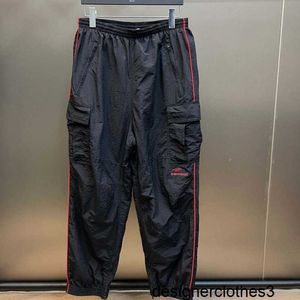 Designer B Family High Edition Paris New Red Line Workwear Shijia Casual Guard Pants Herr- och kvinnors lösa avslappnade fötter Guard Pants 0chk