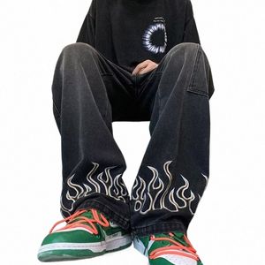 Wiosenna jesieni męskie dżinsy koreańskie uliczne ubrania Ubranie Hip Hop swobodne dżinsy Skateboarding Spodnie czarne dżinsy z haftem płomieniowym o7mm#