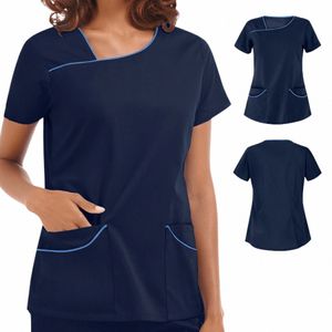 Krankenschwester Uniform Frauen Kurzarm V-Ausschnitt Tops Arbeitsuniform Einfarbige Taschenbluse Arbeiter Peeling Krankenschwester Uniforme Clinico N5IW #