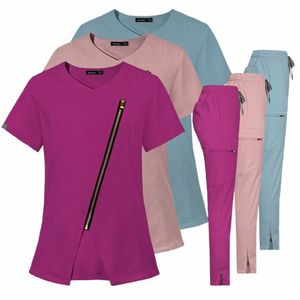 Donne Infermiera medica Abbigliamento da lavoro Scrub Uniforme Sala operatoria Top e pantaloni Fi Groomers Pet Veterinario Zipper Set sanitari q2Jy #