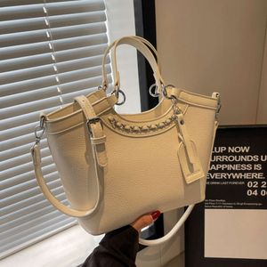 As lojas de bolsas 5adesigner estão vendo os preços explodirem Alta qualidade para mulheres com grande capacidade Nova bolsa crossbody elegante balde portátil feminino