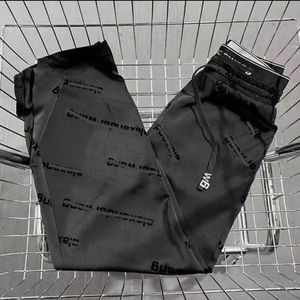 Pantaloni da donna firmati pantaloni a vita alta elastici con fusciacca con stampa da donna pantaloni sportivi in raso da donna gamba larga vita elastica pantaloni casual da tutti i giorni vita dimagrante