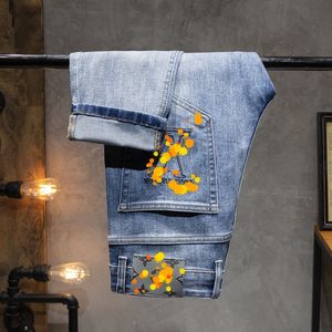 Jeans masculinos primavera verão fino homens fino ajuste europeu americano lvicon high-end marca pequena calças retas F264-09