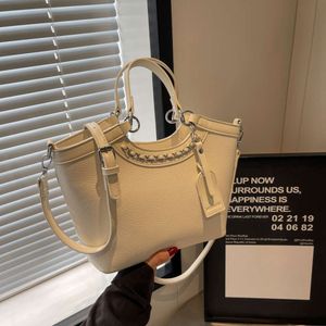 I negozi di borse di 5adesigner stanno vedendo esplodere i prezzi Texture per le donne Nuova borsa a tracolla alla moda e secchiello portatile personalizzato