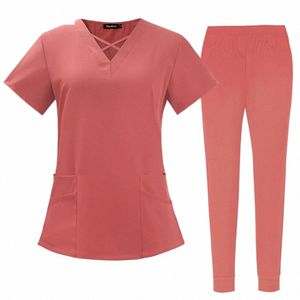 liquidazione Scrubs Uniformi infermieristiche per donna Uomo Anestesista Set Top e pantaloni da jogging Tessuto sottile Sala operatoria Abbigliamento da lavoro medico 86VM #