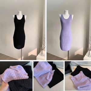 2024 vestido de designer para mulher verão moda marca encaixe algodão sem mangas fino ajuste sexy moda camisola sólida elástica apertada mini saia