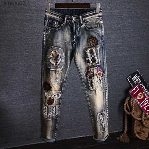 Herren Jeans Hosen Tränen der Herren Jeans bestickte Herren Jeans mit Löchern gebrochene Risse Vintage Luxus geschnitten Plus Größe billig Gothicl2403