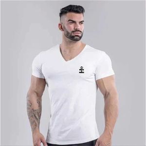 Camisetas masculinas Novo verão algodão camiseta masculina com decote em v design de moda ultra slim fit camiseta esportiva masculina camiseta top manga curta camiseta masculina j240330