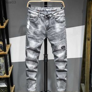 Mäns jeans Autumn Mens Fashion Jeans Fashion Gray Slim Fit Conical Denim Trousers Letter Brodery Printing Trend Youth Hip Hop Clothingl2403