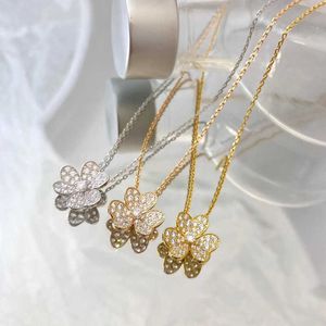 Designer märke van tre bladblomma halsband kvinnors litet gräshänge pläterat med 18k guld diamant full av