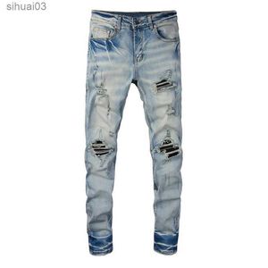 Mäns jeans män knäckt läder veckad lapp cykla jeans gata kläder elastiska denim leggings hål tårar smärtade byxa2403