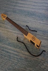 I Stock Mini Travel Electric Guitar Portable Mute Folk Guitar High Comfort Guitar Patent Products äkta hela9766682