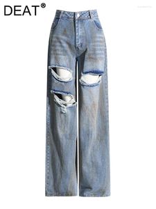 Kvinnors jeans mitt midja orolig färgad målad lång rak ihålig ut denim byxor 2024 vinter mode 29l3206