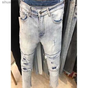 Mäns jeans 2017 Lätt blå delad tråd tår patch arbetskläder jeans street kläder ultra tunn elastisk denim kon Mens motorcykel mens jeansl2403