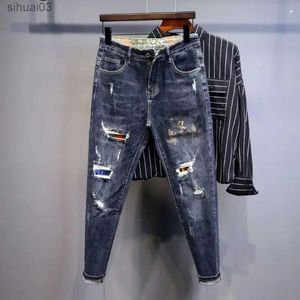 Pantaloni per jeans maschili jeans rotti affusolati per uomini con holesl2403