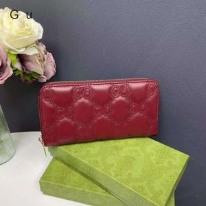 Plånbok 65% europeisk och amerikansk ljus lyxdesigner handväska fancano varumärke live välfärd nytt lychee läder mångsidigt mode från långa kvinnors kortväska mjuk väska