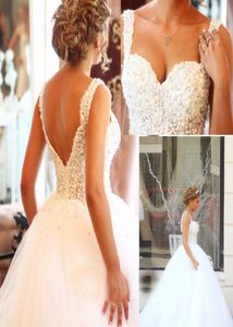 Abiti da sposa africani Sexy scollo a V profondo corsetto abito di sfera abiti da sposa economici cap maniche bianche abiti da noiva2044609