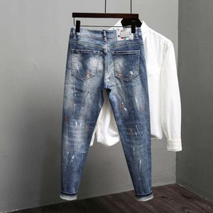 Jeans masculinos 2024, novo patch desgastado, corte justo, tubo reto, marca de moda americana com tinta salpicada, calças compridas versáteis de primavera e outono