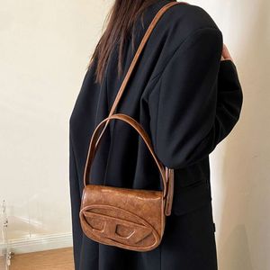 7a lüks omuz çantası fabrika satışı niş haysiyet yeni ürün tek crossbody alt kol altı jingle moda el tipi baharatlı kız tarzı maillard küçük kare kadınlar için