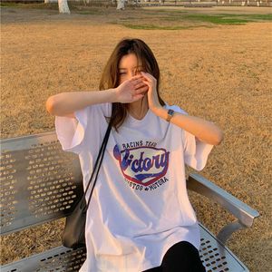 Koreansk stil vintage kortärmad t-shirt för kvinnor löst passande sommarins trendiga harajuku high street halva