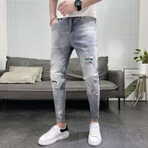 2024 Spring New Light Blue Perforated Patch Jeans for Men's Fashion Trend Trendy Slim Fit Small Feet Pants Thin Style