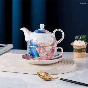 Teaware sätter vintage porslinste för en teaset guld trim blommig tekanna kopp med fat set pärla luster utsökta målningar