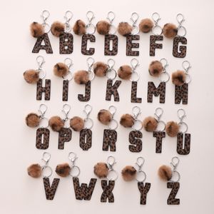 Fashion Leopard 26 Letters Keychain Furry Pom Pom Ball Pendants for Car Keychains Accessories PU Leather Cowboy Style Keyring