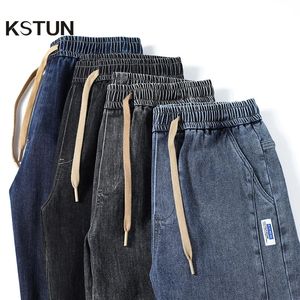 Jeans para homens soltos fit joggers calças de tamanho grande calça folgada harém perna larga cintura elástica as calças jeans de jeans de jeans cônica 240419