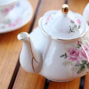 Чайные наборы Noble Bone Bone China Teapot 500 мл розовый камелия кофейник набор дома высококлассные фарфоровые кувшины кафе Teaware Teaware Pot Porm