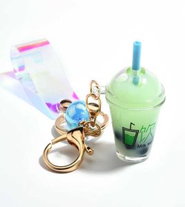 Cute Mini Bottle Keychain Diy Milk Tea Keyring Moving Liquid Bag Charm Jewelry Accessories Women Luxury Cool Gift Whole G10191041036