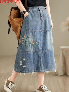 Woman Ethnic Style Literary Embroidered Ripped Button Denim A-line Skirt Raw Edges Loose Casual High-waisted Mid-calf 240424