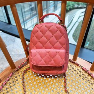 Mini skolväska ryggsäck lyxdesigner bokväska 24C kvinnors lychee kornskål fashionabla flickas lilla ryggsäck handbagjx mångsidig het säljande axelväska