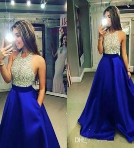Royal Blue Ball Gown Prom Kleider 2020 sexy Juwel Lang Abendkleider Kleider mit funkelnem Perlenmieder für Teenager Party1294802